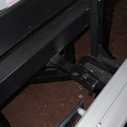 Adjustable rowing machine with a black frame and a sliding seat mechanism.